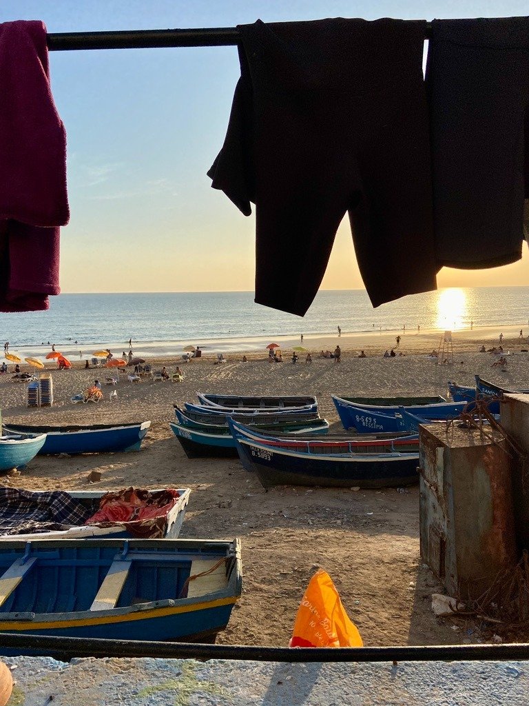 Beautiful landscape of Taghazout beach with surfers